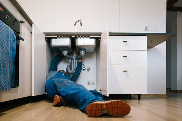 Professional Drain Cleaning technician working in Auburn, ME